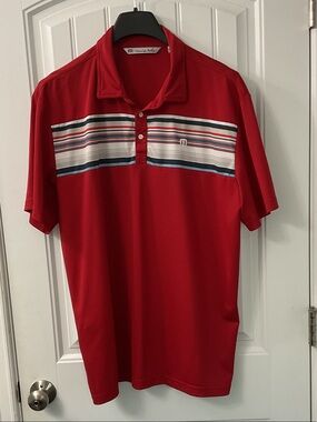 Travis Mathew Red Polo with Multi-Color Chest Stripe